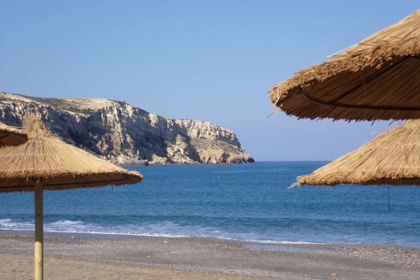 beach-umbrellas-at-beach-komos-odigitria-monastery-matala-south-heraklion-crete